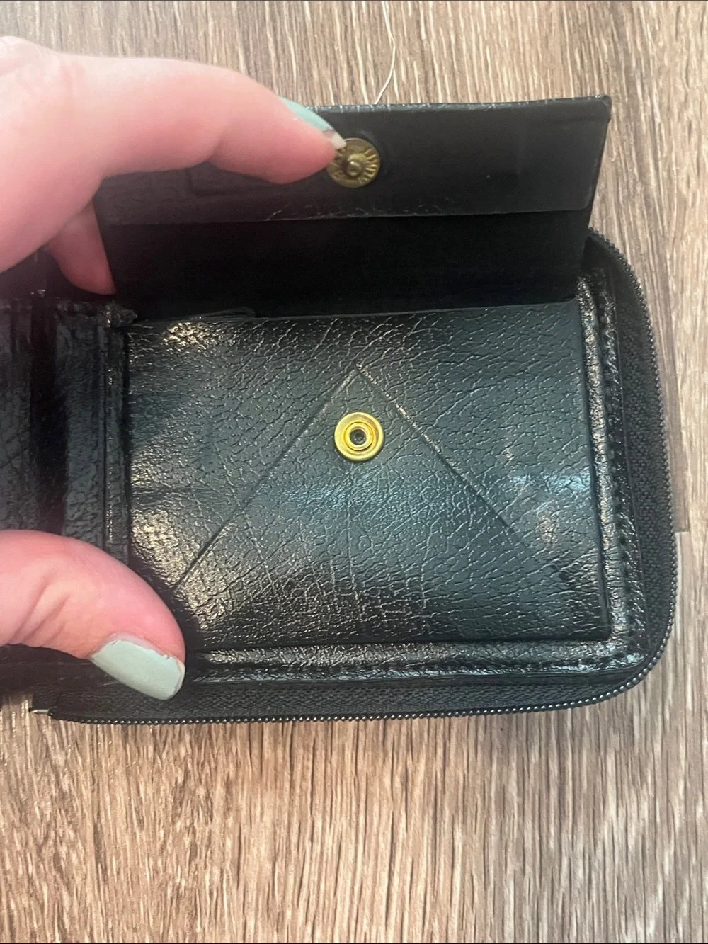 split Black Leather Zip-Around Wallet with Gold Accents